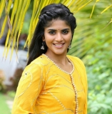 Megha Akash in yellow pizma