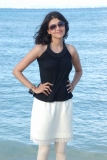 kajal agarwal black top and white skirt