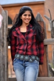 Megha Akash red check shirt and jeans with ring belt