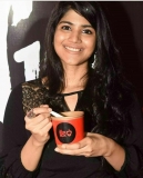 Megha Akash red cup tea
